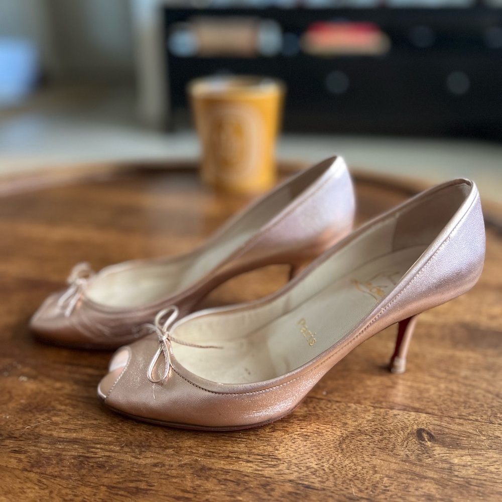 Authentic and super rare unique Louboutin open toe 3 inch heel.